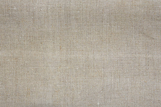 istock natural color folded linen serviette, texture background 2225013665