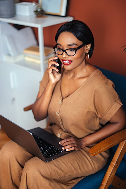 istock Professional at Work on Phone Call and Computer in Home Office 2225013885