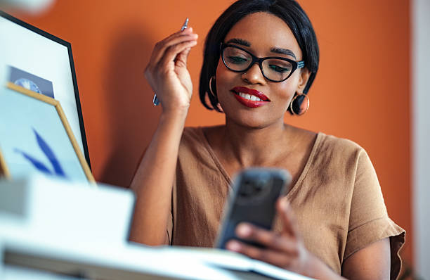 istock Business Professional Engaging With Smartphone in Modern Home Office 2225013903