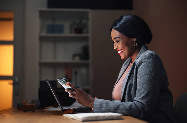 istock Professional Woman Working on Laptop in a Modern Office Setting 2225013905