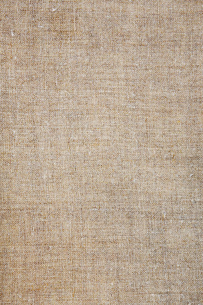 istock natural color folded linen serviette, texture background 2225013959