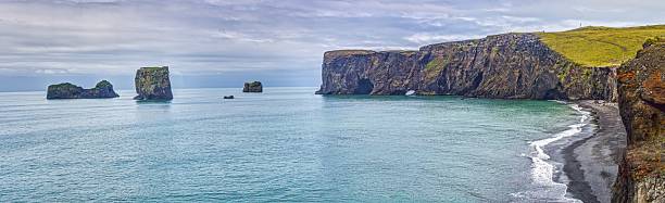 istock Sea stacks and cliffs Reynisfjara beach Iceland 2225014037