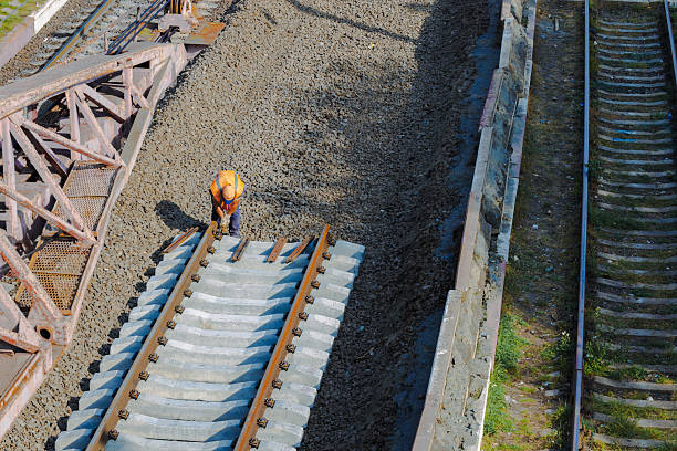 istock industrial engineer hard working worker rail road construction drone top view foreshortening 2225016105