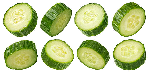 istock Cucumber slices isolated on white background with clipping path, full depth of field 2225018404