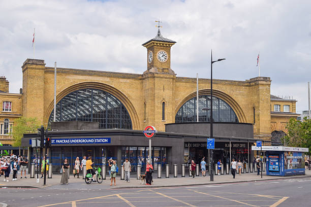 London, UK - July 13 2025: exterior daytime view of King's Cross station and King's Cross St Pancras Underground Station with people walking outside