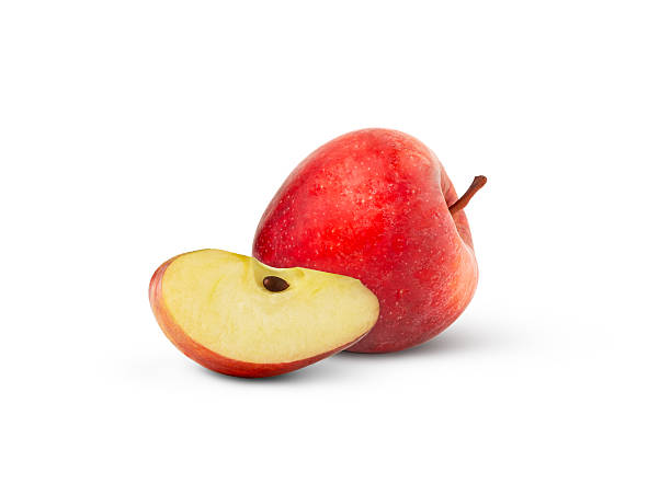 istock Juicy red apple and a cut isolated 2225029543