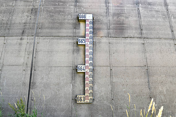 istock Water level gauge on dam wall 2225033652