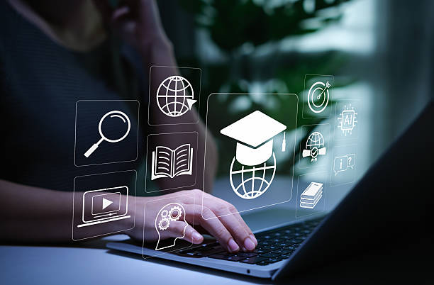 istock Online Education and E-Learning Technology Concept. Person using laptop for online education with learning tools icons, graduation cap, AI, books, global connectivity, study platform, learn virtual, 2225033916
