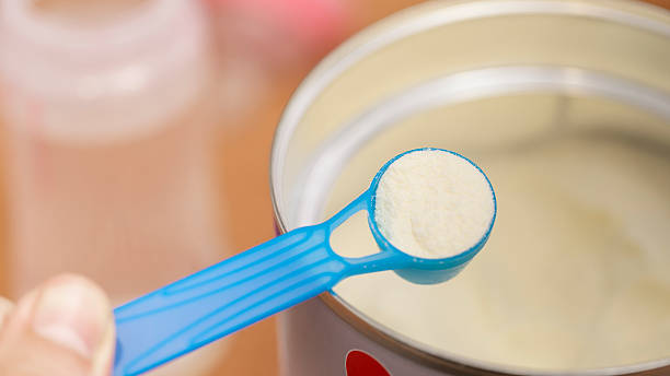 istock Preparing powdered milk for infant feeding 2225034751