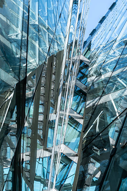 Germany, Berlin, Charlottenburg, June 21, 2025 - Glass facade of a modern office building