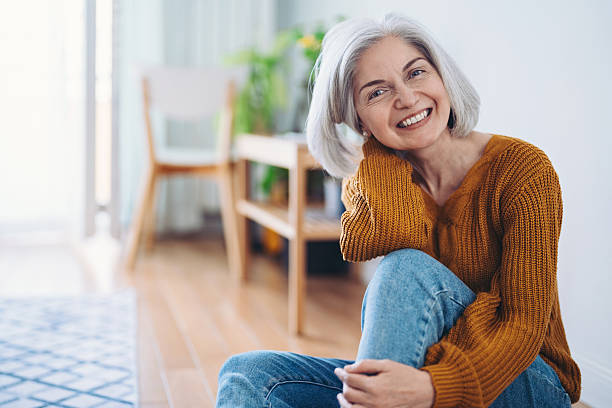 istock Happy mature woman at home 2225042666