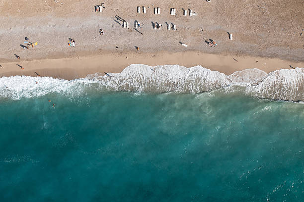 istock Aerial View of Tranquil Sandy Beach and Waves 2225042970