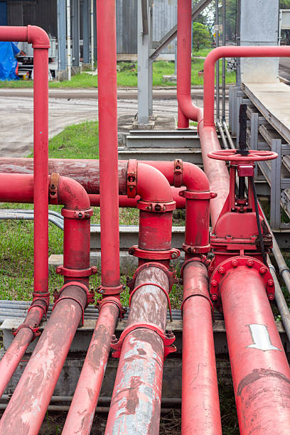 istock Complex red piping system in an industrial setting presents a vibrant visual arrangement 2225043009