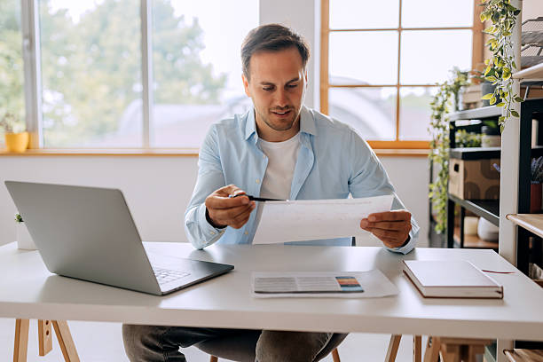 istock Remote employee working on laptop from home 2225044315