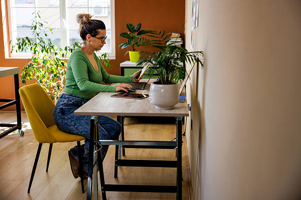 istock Female Freelancer in Home Office Using Laptop 2225044624
