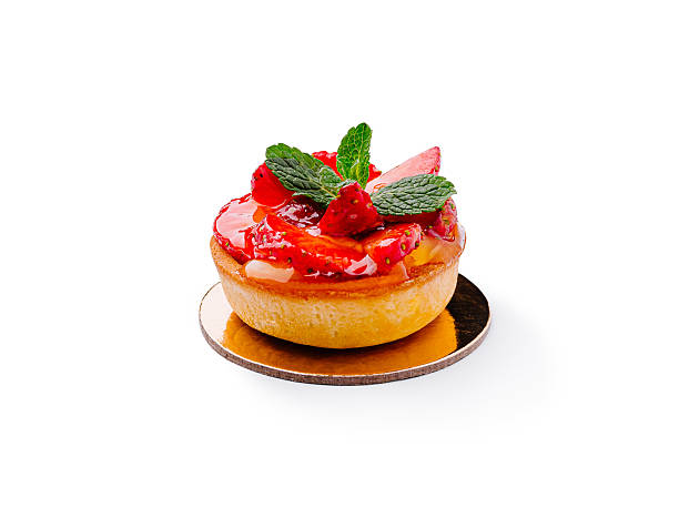 istock Delicious strawberry tart with mint garnish in a bright setting 2225053939