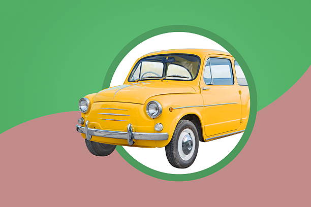 istock yellow retro car on green red background 2225053955
