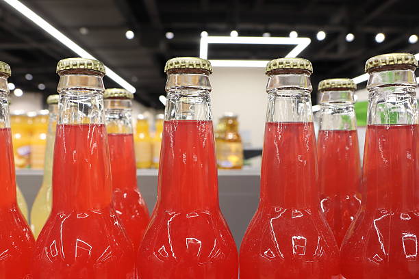 istock A Collection of Vibrantly Colored Bottles Filled with Refreshing Soft Drinks on Display 2225054037