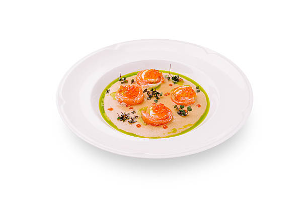 istock Gourmet salmon sashimi with citrus sauce and microgreens on a white plate 2225054054
