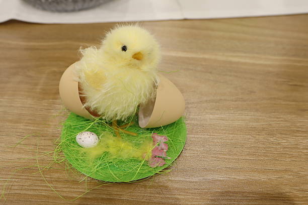 A delightful and cute little chick hatching from an egg, perfect for your spring celebrations