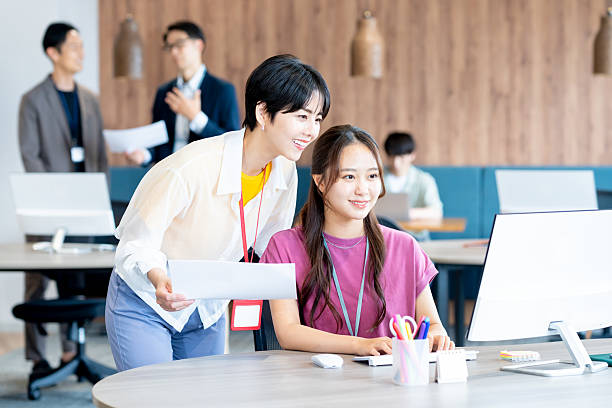 istock business woman working in the office 2225058731