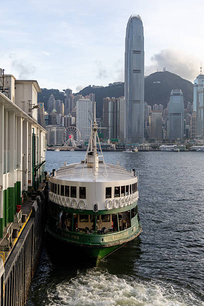 Hong Kong - July 14, 2025 : Star Ferry at Tsim Sha Tsui Star Ferry Pier, Kowloon, Hong Kong. The Star Ferry plies its way between Hong Kong Island and Kowloon.