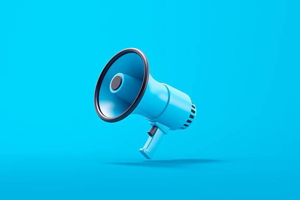 istock Single blue electric megaphone with a handle stands on a blue background 2225061633