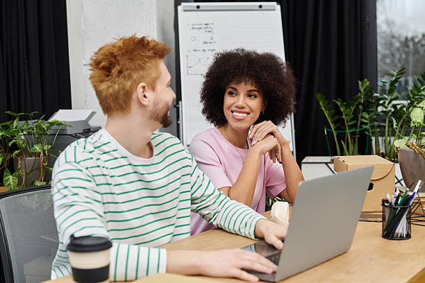 istock Cheerful colleagues talking in new modern office 2225061920