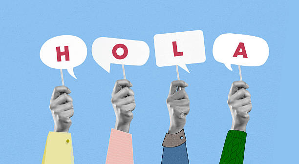 istock Hola Spanish Word Holding by Hands 2225062209