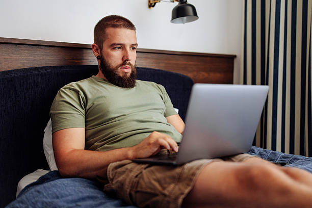 istock Focused Man on Laptop for Freelance Work 2225062575