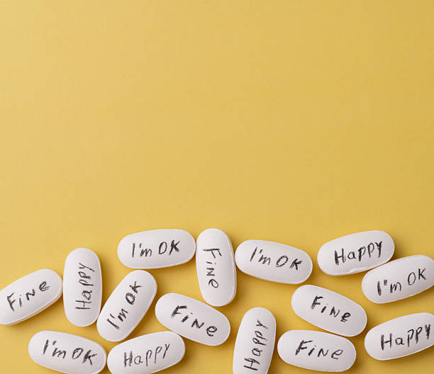 istock Medication pills with Joy, fine and I´m OK written with copy space. Suicide prevention 2225063146