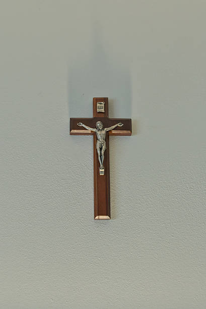 istock Isolated Wooden Jesus Crucifix on White Background 2225063460