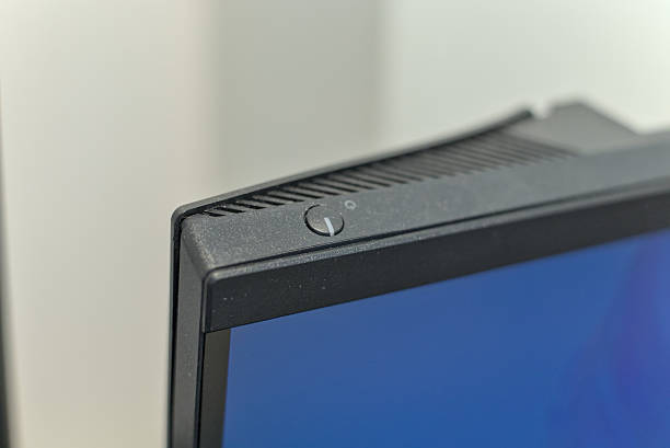 istock Power Button on Edge of Computer Monitor Close‑Up 2225063600