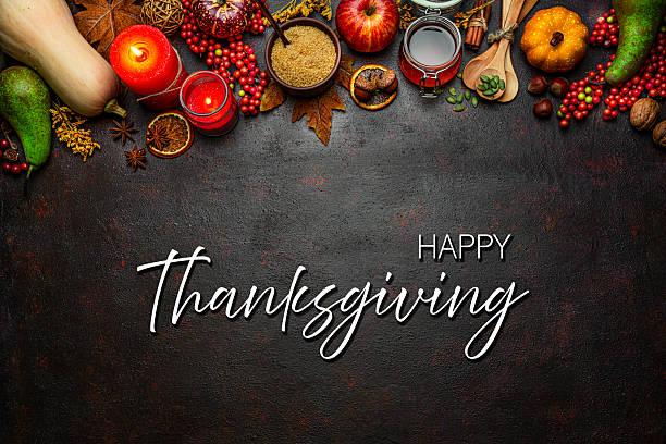 istock Autumn or Thanksgiving border. Decor with burning candles, fallen leaves, nuts, cinnamon sticks and pumpkin. Greeting card or copy space. October or season. Happy Thanksgiving concept 2225066641