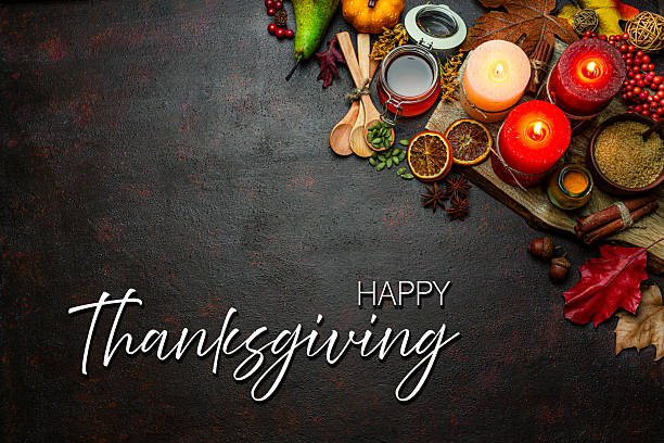 istock Autumn or Thanksgiving border. Decor with burning candles, fallen leaves, nuts, cinnamon sticks and pumpkin. Greeting card or copy space. October or season. Happy Thanksgiving concept 2225066647