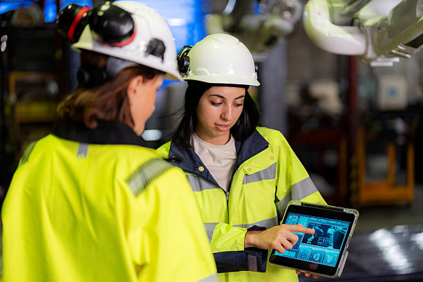 istock A focused female engineer presents a new robotic movement design to a senior engineer using a digital tablet. Their collaboration reflects innovation, technical communication, and a shared vision for efficient robotic mobility in manufacturing. 2225066767