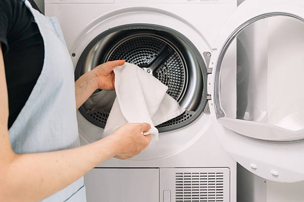 istock Repairing a modern washing machine in a laundry room setting at home 2225068880
