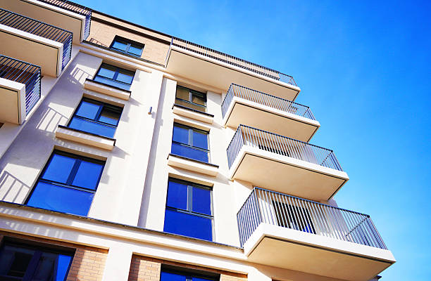 istock Modern facade building on blue sky. Apartment facade. 2225072523