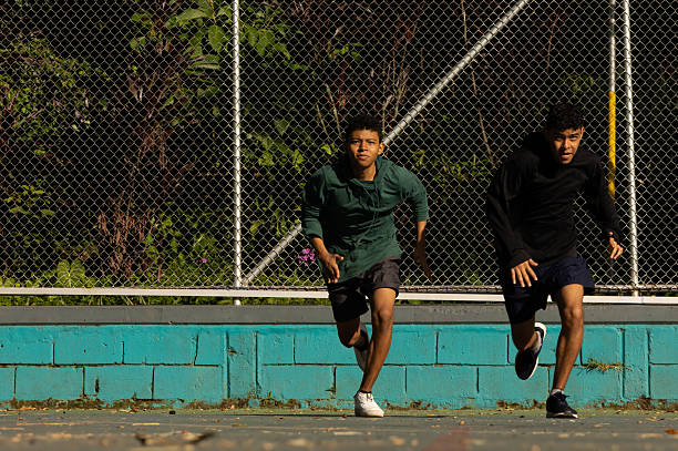 istock Two athletes competing in a race on a court 2225075314