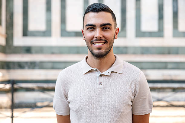 istock Friendly man smiling in outdoor setting 2225075597