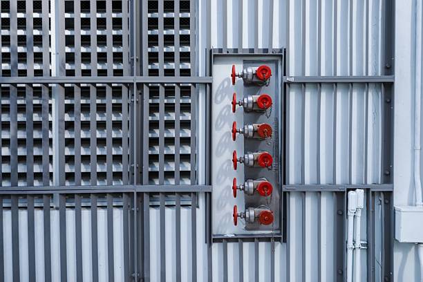 istock Fire department connection valves on building wall 2225075737