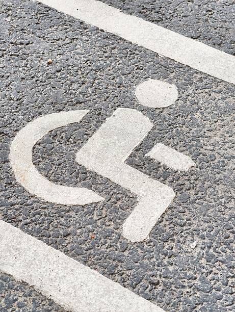 istock Parking space designated for individuals with disabilities 2225086426