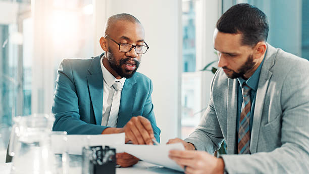 istock Teamwork, planning and documents with business people in office for project proposal, account advisor or research. Budget adviser, company treasurer and paperwork with employees for revenue review 2225086598