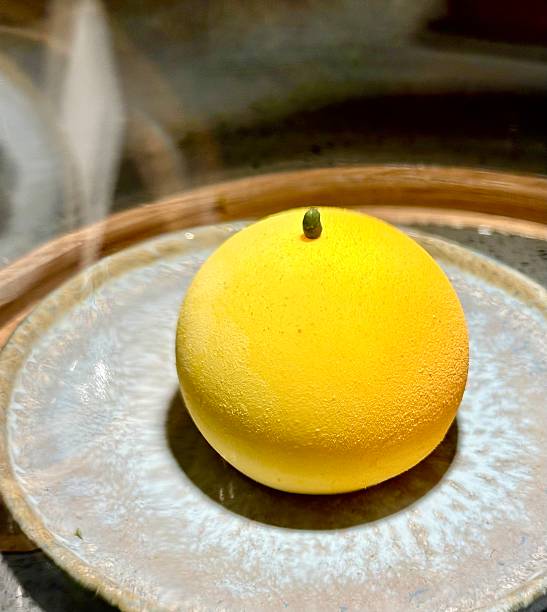 Lifelike Lemon Dessert with Green Stem Accent