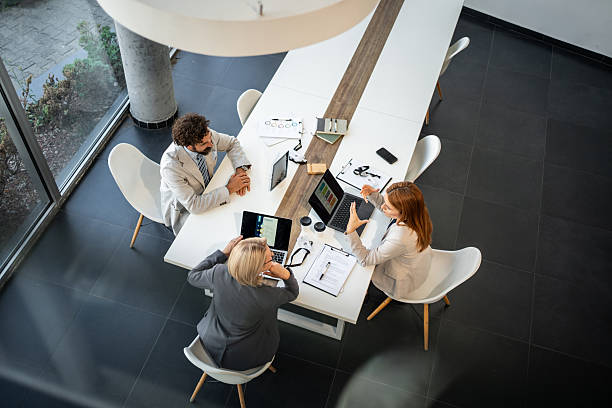 istock Business team discussing strategy during meeting in modern office 2225094777