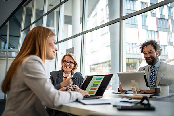 istock Business team analyzing charts on laptop and digital tablet in office 2225094944