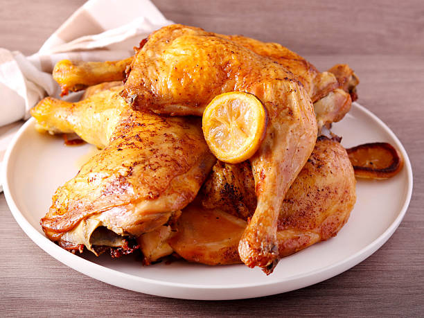 istock Roast lemon chicken legs served 2225095575