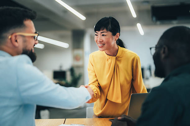 istock Successful business agreement sealed with a handshake in modern office 2225096842