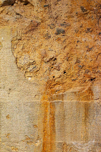 istock abstract background with rusty concrete texture in grunge style. rough rusty stone texture. vertical shot 2225104383