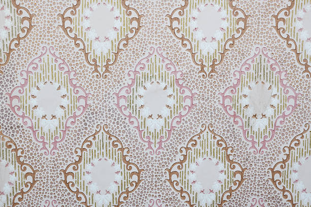 istock Old wallpaper on the wall. Old wallpaper for texture or background. 2225106333
